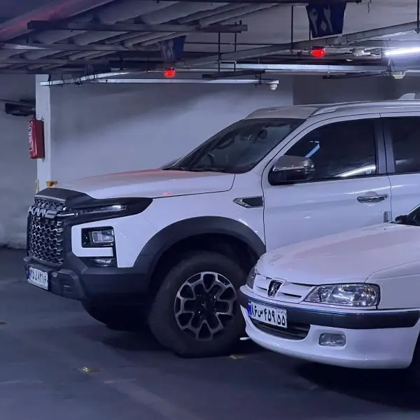 تعویض شیشه جلو کی ام سی T9